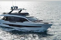 2023 Astondoa AS8 yacht cruising on open water, showcasing sleek design and luxury.