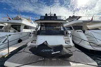 2023 Astondoa AS8 yacht docked with Sea-Doo Spark jet ski on deck.