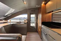 Luxurious interior of 2023 Astondoa AS8 yacht with modern kitchen and sleek design.