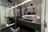Luxurious bathroom in 2023 Astondoa AS8 yacht, featuring modern fixtures and elegant design.