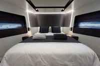 Luxurious 2023 Astondoa AS8 yacht bedroom with modern design and ambient lighting.