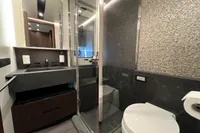 Luxurious bathroom in 2023 Astondoa AS8 yacht with modern fixtures and elegant design.
