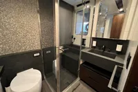 Luxurious bathroom in 2023 Astondoa AS8 yacht with modern fixtures and elegant design.