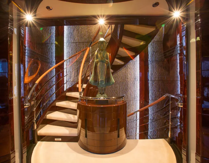 Dream Yacht Photos Pics Luxurious yacht interior with elegant staircase and decorative statue, Abeking & Rasmussen 6430, 2001.