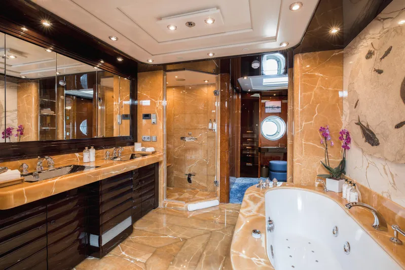 Dream Yacht Photos Pics Luxurious yacht bathroom with marble decor, jacuzzi, and elegant fixtures, Abeking & Rasmussen 6430, 2001.