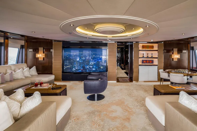 Dream Yacht Photos Pics Luxurious yacht interior with elegant seating, modern decor, and large screen, Abeking & Rasmussen 6430, 2001.