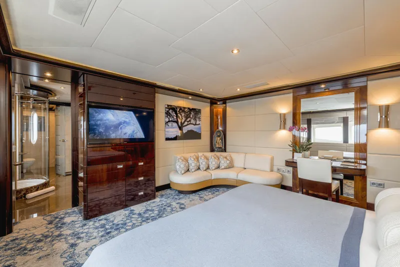 Dream Yacht Photos Pics Luxurious yacht interior with modern decor, featuring a cozy seating area and elegant furnishings.