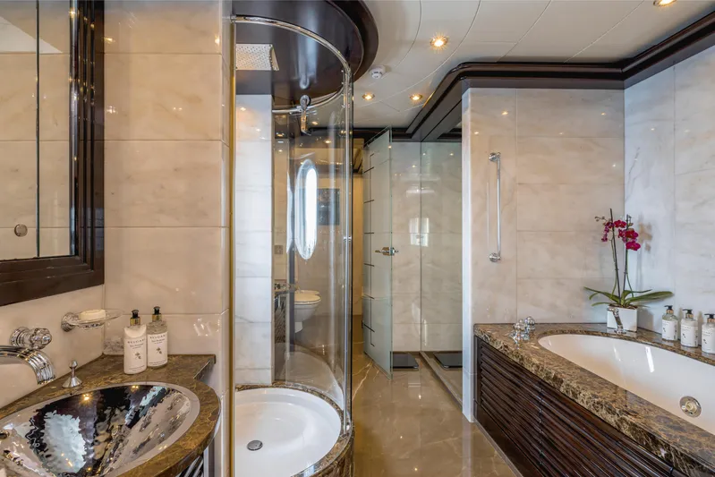 Dream Yacht Photos Pics Luxurious yacht bathroom with modern fixtures, glass shower, and elegant marble accents, Abeking & Rasmussen 6430.