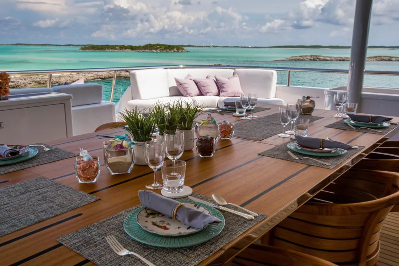 Dream Yacht Photos Pics Luxurious yacht dining setup with ocean view, Abeking & Rasmussen 6430, 2001 model.