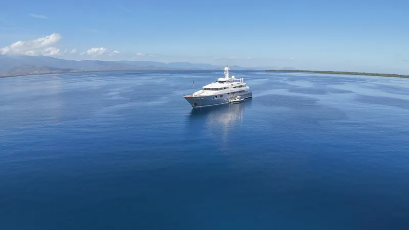 Dream Yacht Photos Pics Luxurious Abeking & Rasmussen 6430 yacht on serene blue ocean, 2001 model.