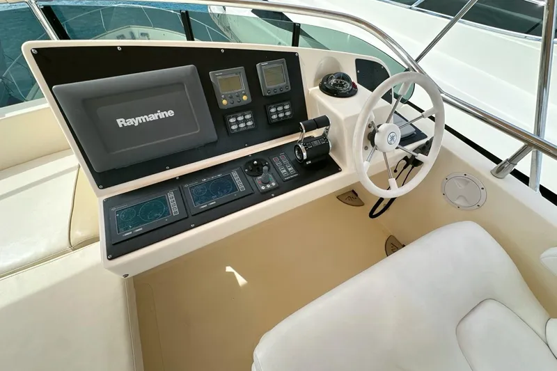  Yacht Photos Pics Cockpit of 2010 Abati Yachts 64 Freeport with Raymarine navigation system.