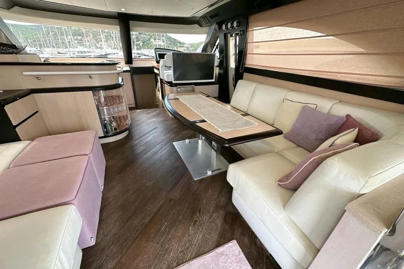  Yacht Photos Pics Luxurious interior of 2010 Abati Yachts 64 Freeport with elegant seating and modern decor.