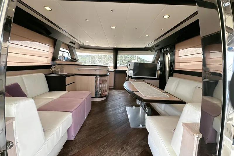  Yacht Photos Pics Luxurious interior of 2010 Abati Yachts 64 Freeport with elegant seating and modern design.