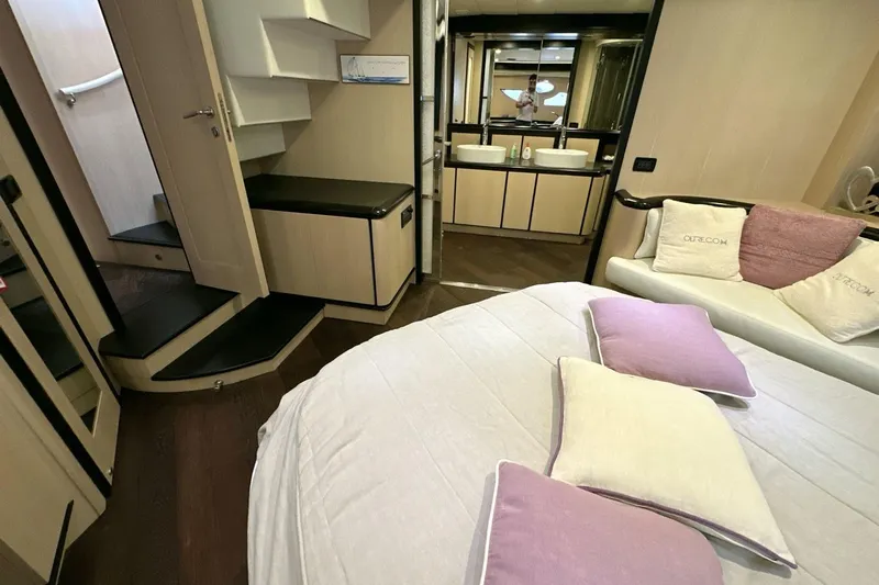  Yacht Photos Pics Luxurious interior of 2010 Abati Yachts 64 Freeport with elegant bedroom and modern bathroom.