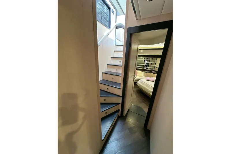  Yacht Photos Pics Interior view of 2010 Abati Yachts 64 Freeport, featuring stairs and a cozy bedroom.
