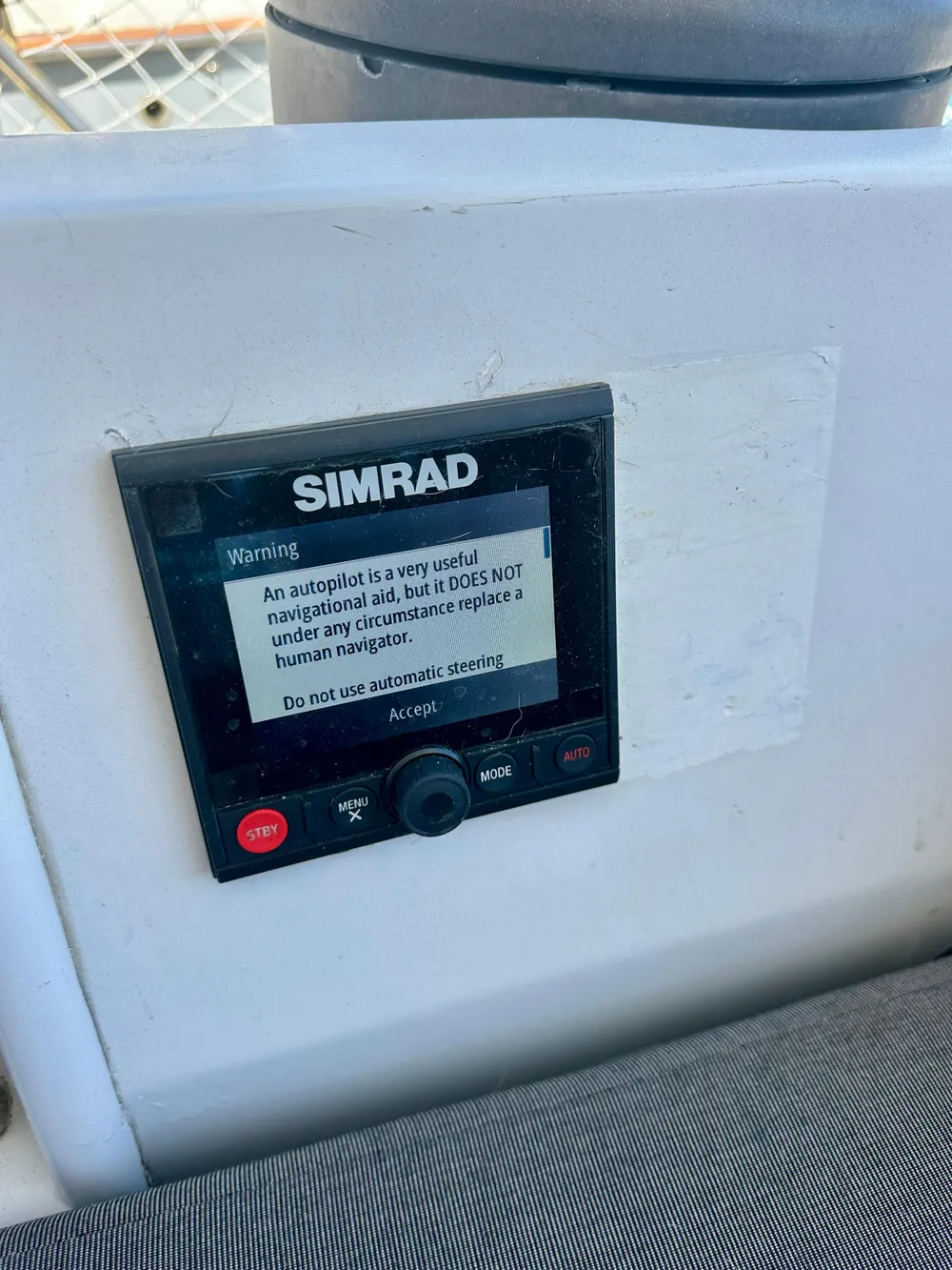 Simrad autopilot warning display on 1983 Tayana 55 sailboat.