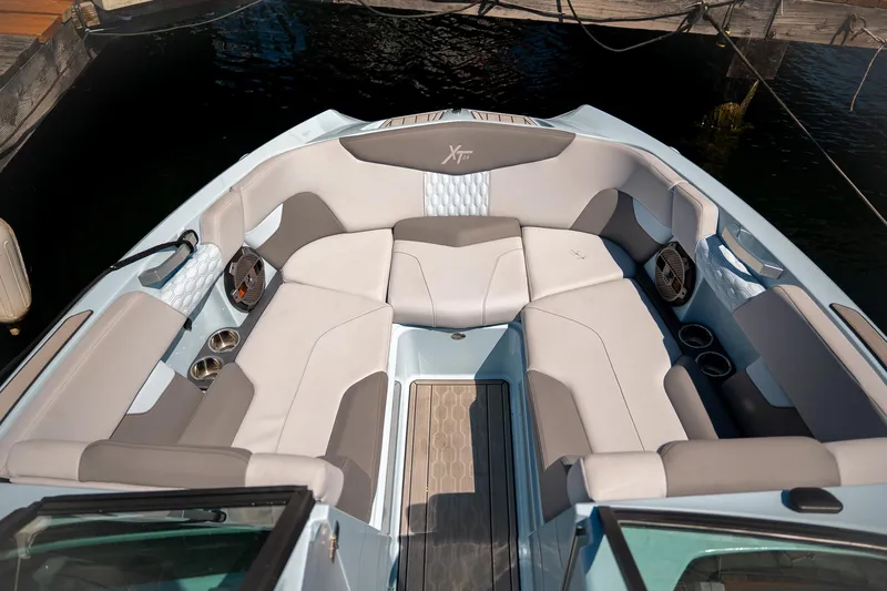  Yacht Photos Pics 2022 MasterCraft XT24 boat interior with luxurious seating and modern design.