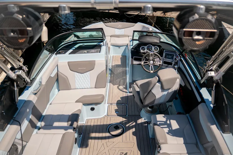  Yacht Photos Pics 2022 MasterCraft XT24 boat interior with modern seating and dashboard design.