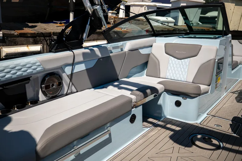  Yacht Photos Pics 2022 MasterCraft XT24 boat interior with sleek seating and modern design.