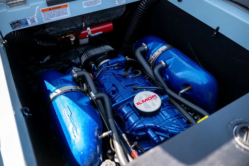  Yacht Photos Pics 2022 MasterCraft XT24 engine compartment with Ilmor marine engine.