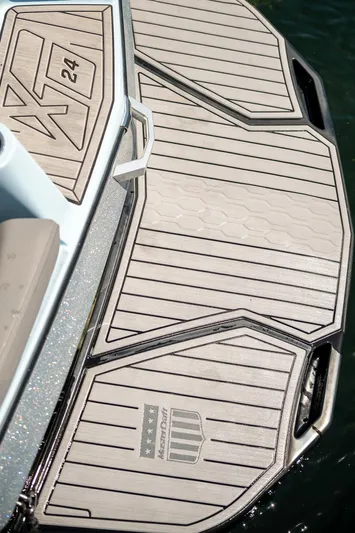  Yacht Photos Pics 2022 MasterCraft XT24 boat deck with sleek design and branding details.