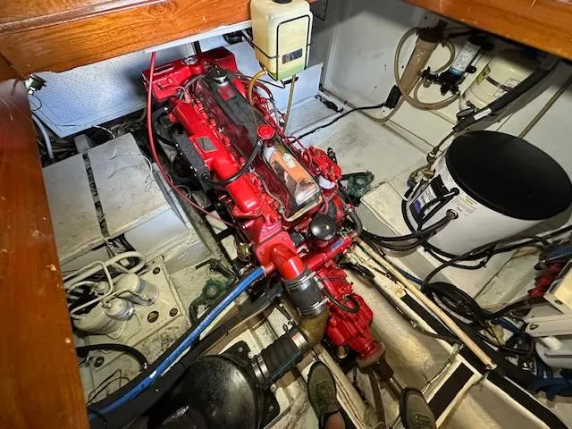 Tortuga Yacht Photos Pics Engine room of a 1987 Kadey-Krogen 42 with a red marine engine.