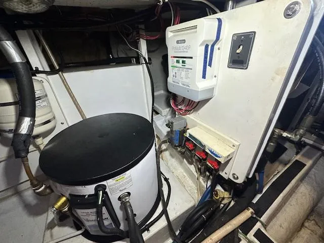 Tortuga Yacht Photos Pics Engine room of 1987 Kadey-Krogen 42 with electrical components and equipment.