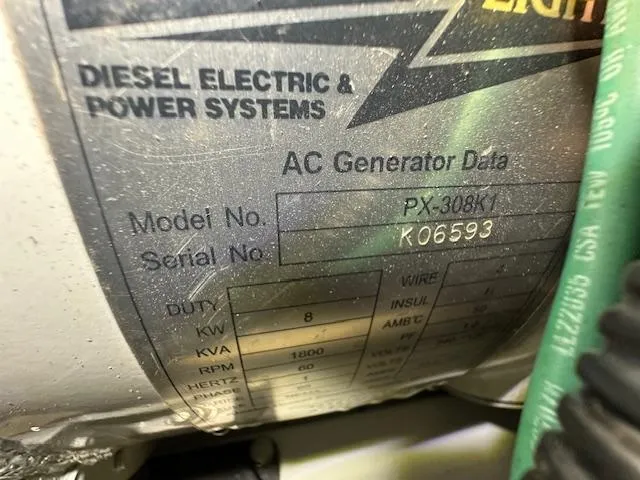Tortuga Yacht Photos Pics Close-up of AC generator data plate on a 1987 Kadey-Krogen 42.