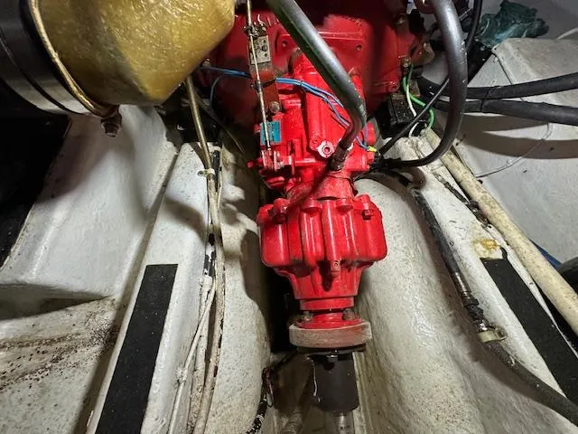 Tortuga Yacht Photos Pics Engine compartment of a 1987 Kadey-Krogen 42 boat, featuring a red engine component.