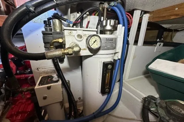 Tortuga Yacht Photos Pics Engine room of 1987 Kadey-Krogen 42 with mechanical components and wiring.