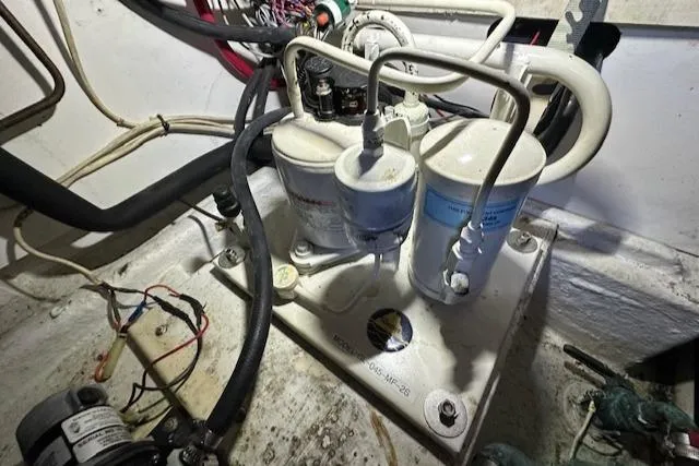 Tortuga Yacht Photos Pics Engine room of a 1987 Kadey-Krogen 42, featuring fuel filters and wiring.