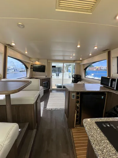  Yacht Photos Pics Interior of a 2004 Meridian 381 yacht, featuring modern furnishings and spacious layout.