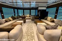 Luxurious interior of 2024 Custom 29m Charter MY yacht with plush seating and modern decor.