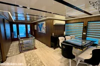 Luxurious interior of 2024 Custom 29m Charter MY yacht with elegant dining area.