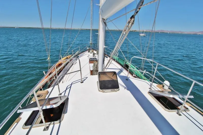 Ocean Villa Yacht Photos Pics Centre cockpit pilot house steel cutter motorsailer on open water, 1991 model.