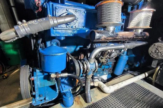 Ocean Villa Yacht Photos Pics Engine of a 1991 Custom Centre Cockpit Pilot House Steel Cutter Motorsailer.