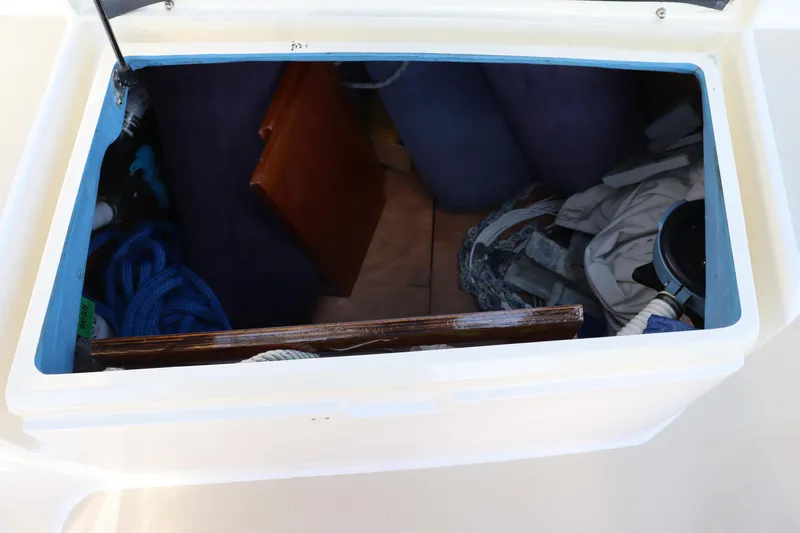 Cianna Yacht Photos Pics Storage compartment on a 2001 Sabre 402 sailboat, containing ropes and equipment.