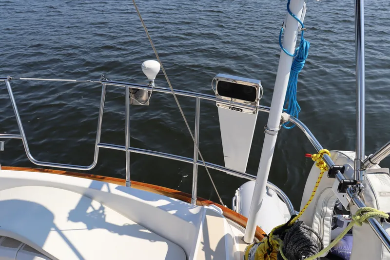 Cianna Yacht Photos Pics Sailboat deck view, Sabre 402, 2001 model, with ocean background.