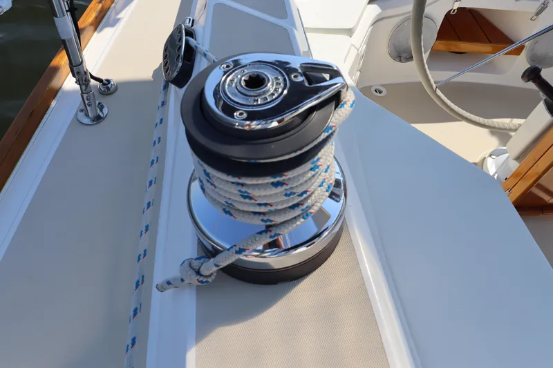 Cianna Yacht Photos Pics Winch on 2001 Sabre 402 sailboat deck with coiled rope.