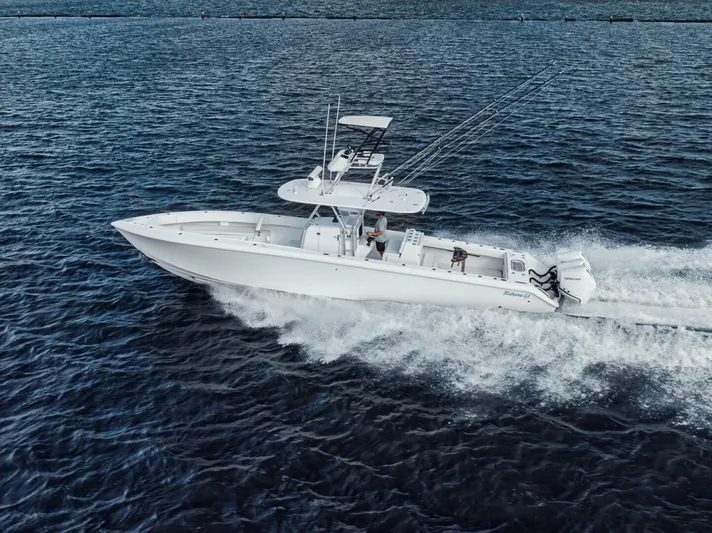 Southpaw Yacht Photos Pics 2015 Bahama 41' boat cruising on open water.