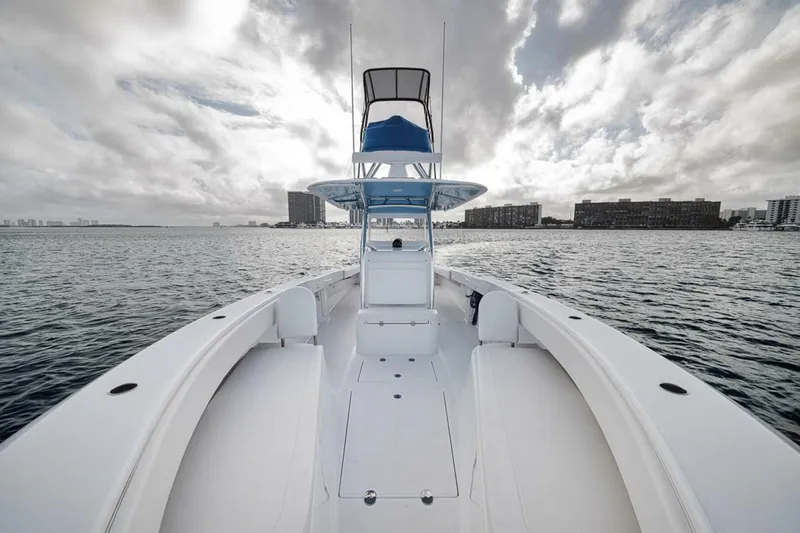 Southpaw Yacht Photos Pics 2015 Bahama 41' boat on open water under cloudy sky.