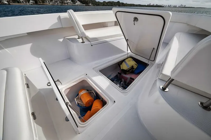 Southpaw Yacht Photos Pics 2015 Bahama 41' boat storage compartments with safety equipment.
