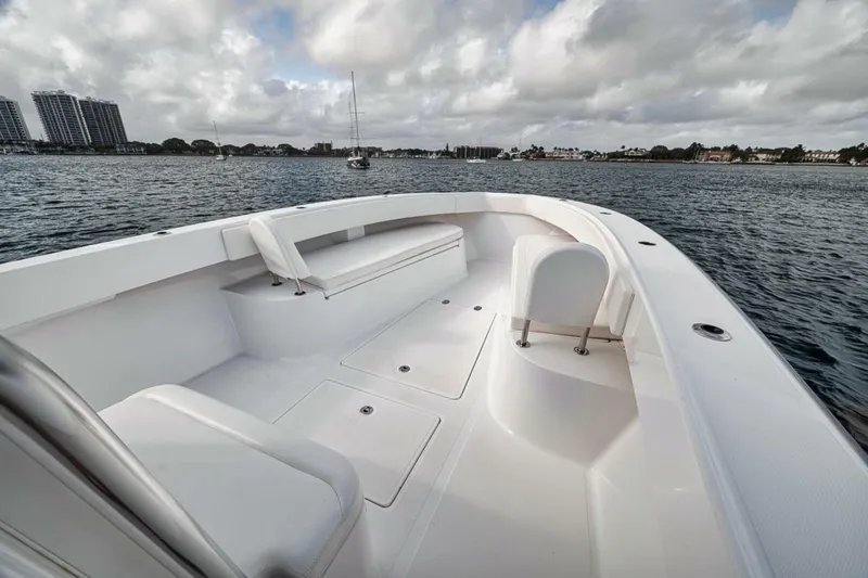 Southpaw Yacht Photos Pics 2015 Bahama 41' boat with spacious deck on calm waters.
