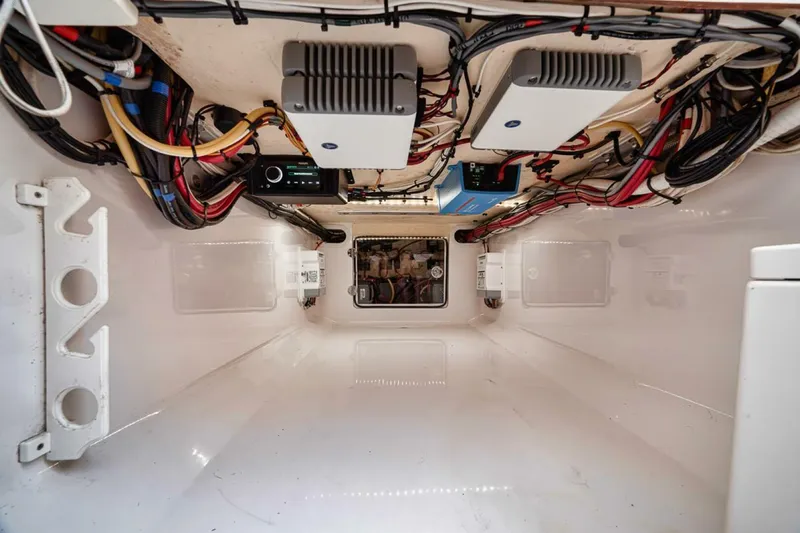 Southpaw Yacht Photos Pics Engine compartment of 2015 Bahama 41' boat with wiring and equipment.