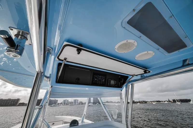 Southpaw Yacht Photos Pics 2015 Bahama 41' boat interior with blue ceiling and electronic controls.