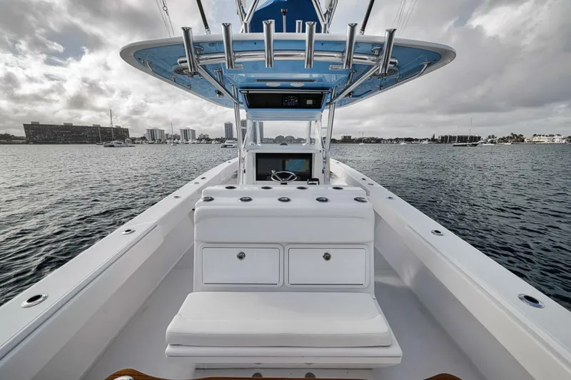 Southpaw Yacht Photos Pics 2015 Bahama 41' boat on water, featuring sleek design and spacious deck.
