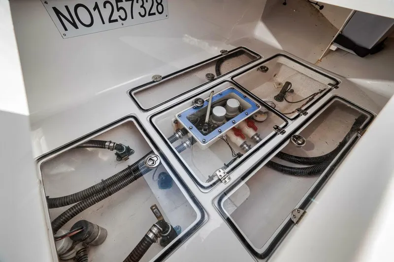 Southpaw Yacht Photos Pics 2015 Bahama 41' boat interior with visible compartments and wiring.