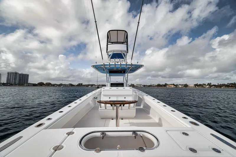 Southpaw Yacht Photos Pics 2015 Bahama 41' boat on water under cloudy sky.