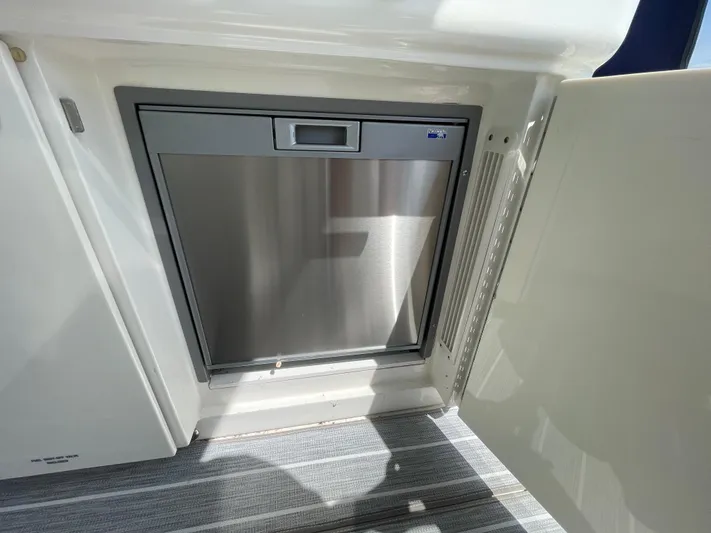  Yacht Photos Pics Stainless steel refrigerator on 2010 Sea Ray 450 Sundancer yacht interior.