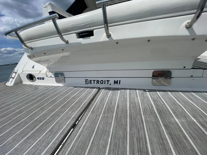  Yacht Photos Pics 2010 Sea Ray 450 Sundancer boat docked, featuring Detroit, MI lettering.